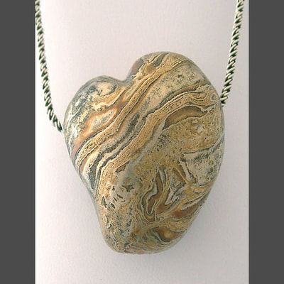 Mixed metal heart